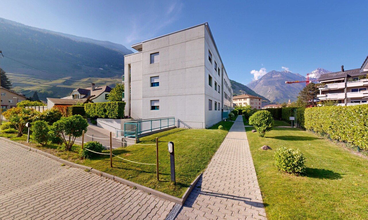 view of building exterior with a mountain view