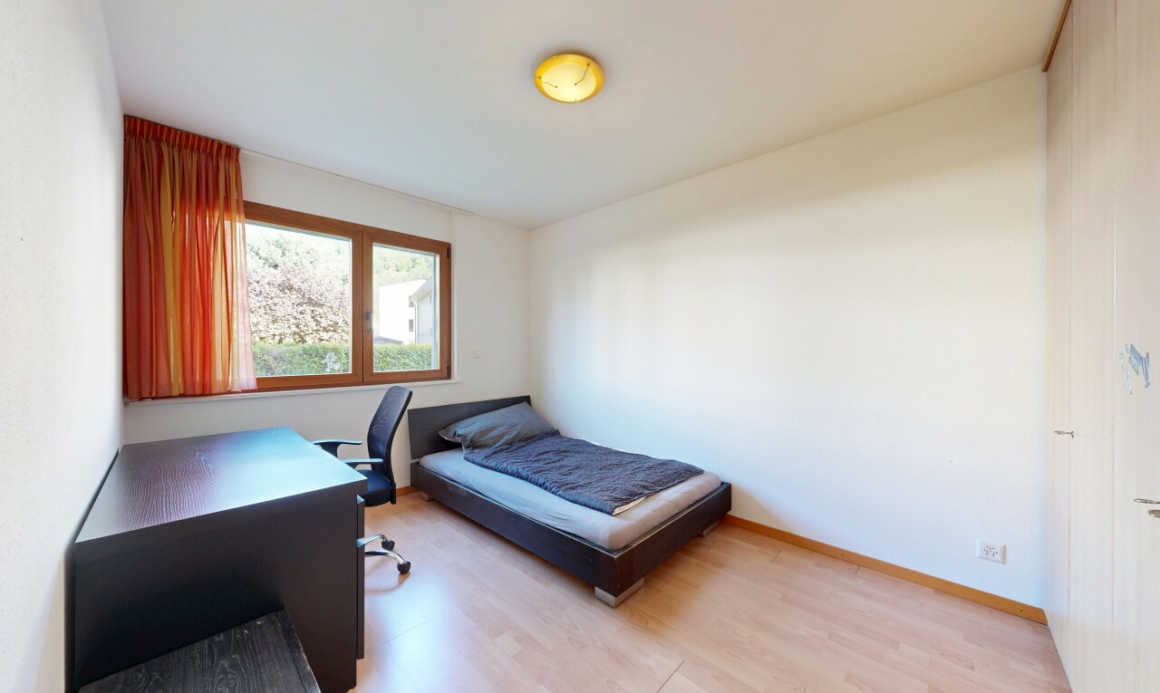 room featuring a desk and light wood-style floors