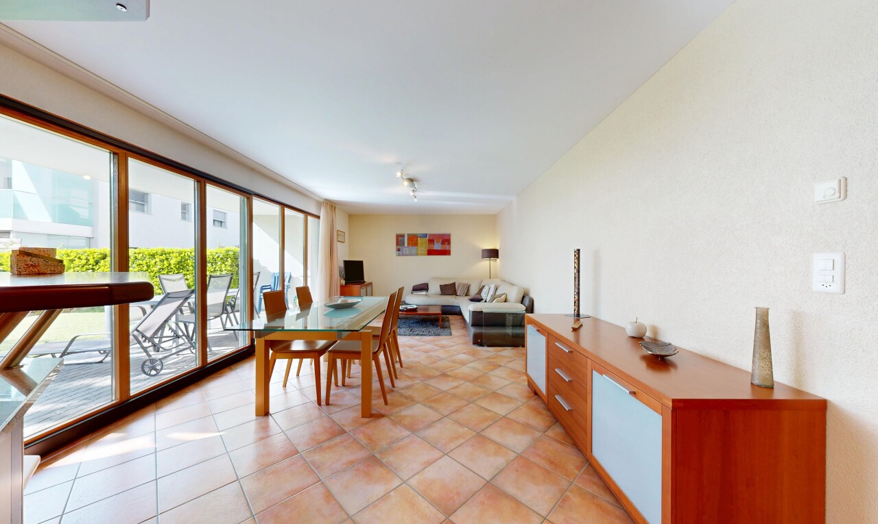 living / dining room featuring light tile patterned floors