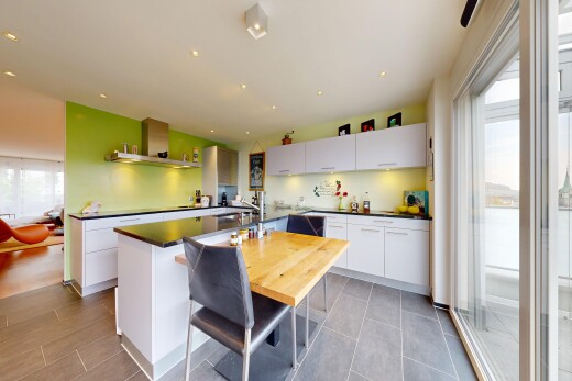 küche mit dunstabzugshaube, dark countertops, arbeitsplatten, white cabinets, und weiße schränke