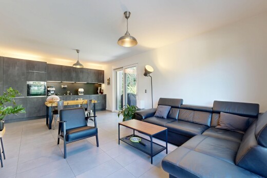 living / dining area with pendant lighting