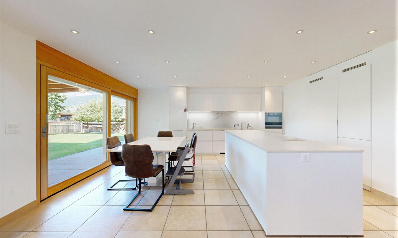 kitchen featuring white cabinetry, light countertops, a spacious island, modern cabinets, and recessed lighting