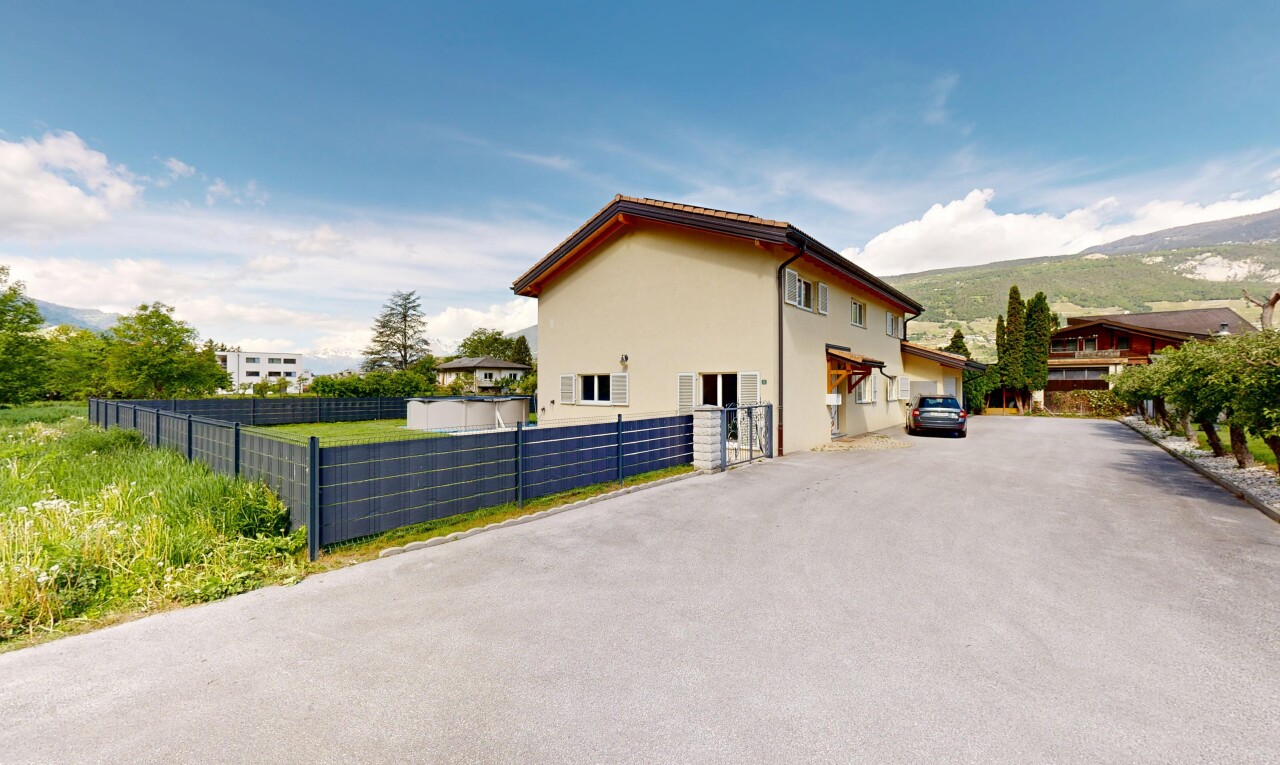view of home featuring stucco siding