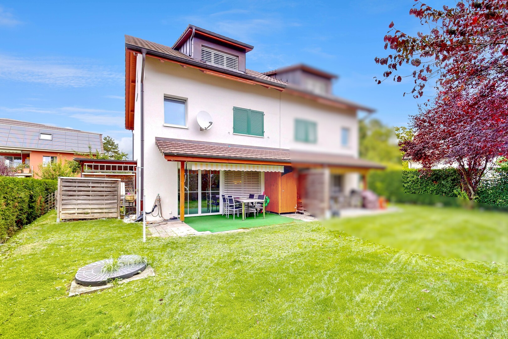 view of home featuring stucco siding and a patio area