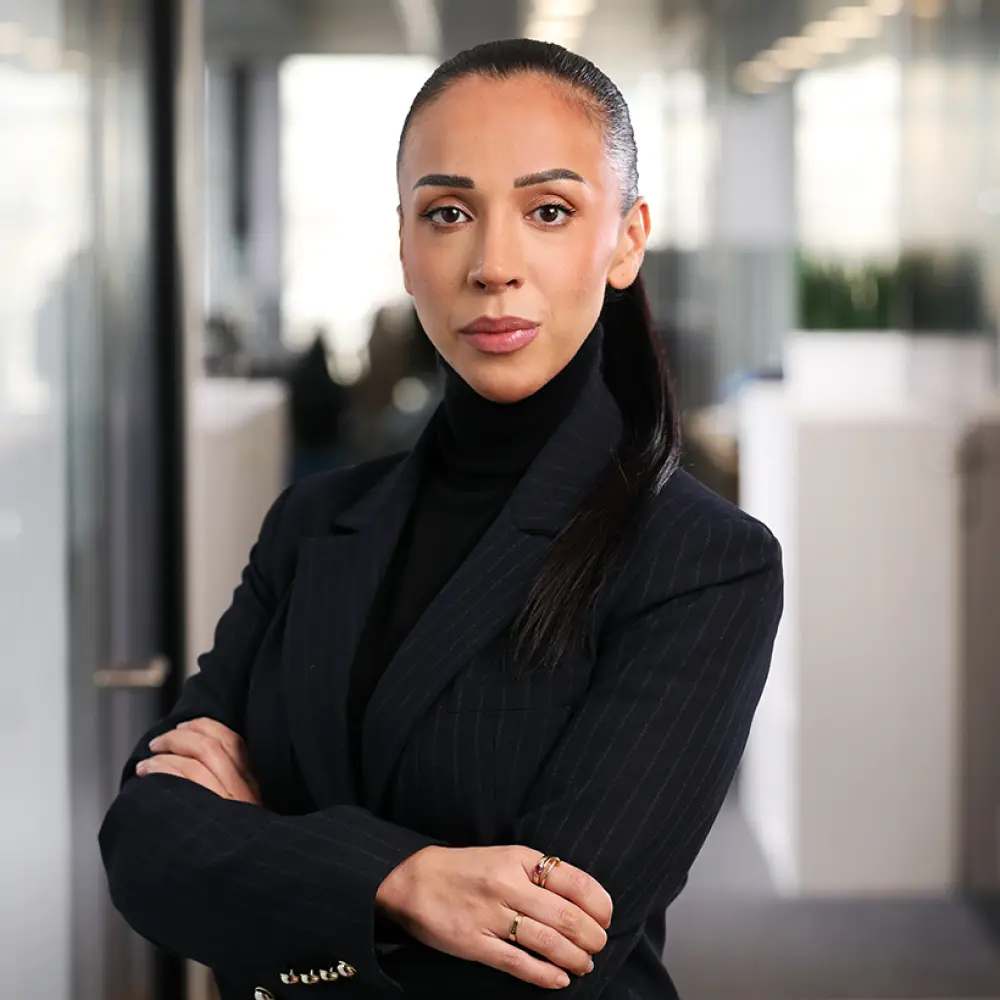 Portrait of Claudia Loureiro, Financial advisor, taken in our Lausanne office.